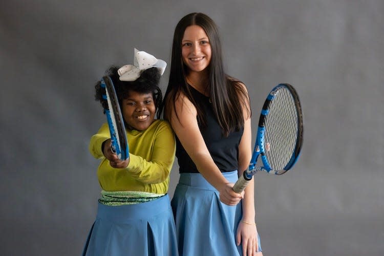 An Alliance City Schools elementary school student poses with a high school student during a #LikeAGirl event in which the older students help their younger counterparts see what it would be like to take part in high school programs. The program that pairs younger and older girls has been ongoing since 2019.