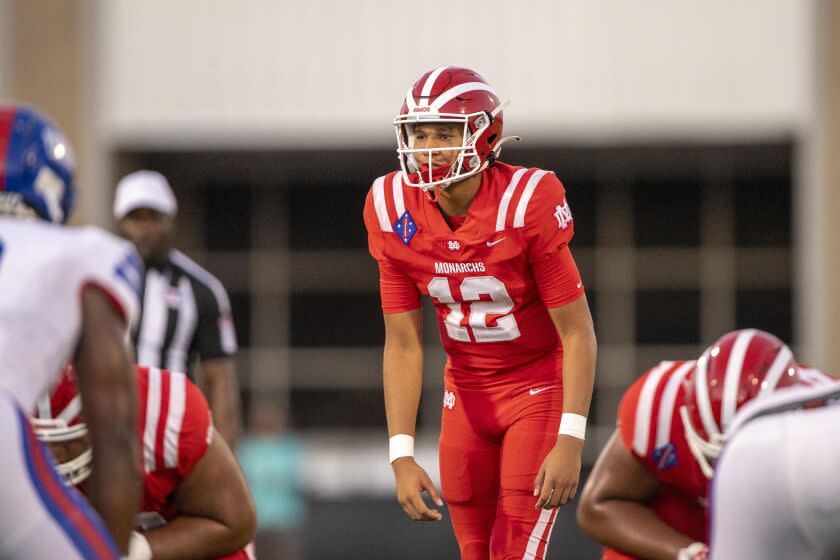 Duncanville, TX - August 27: Mater Dei Monarchs quarterback Elijah Brown (12) during the game against the Duncanville Panthers during the game in Panther Stadium on Friday, Aug. 27, 2021 in Duncanville, TX. (Jerome Miron / For the LA Times)