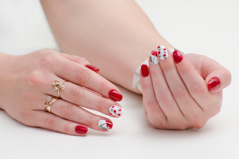 Red cherry nail design.