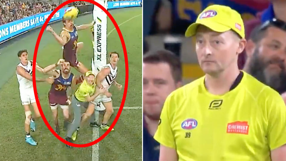 Seen here, the AFL goal umpire that became a cult hero in Brisbane's win over Fremantle.