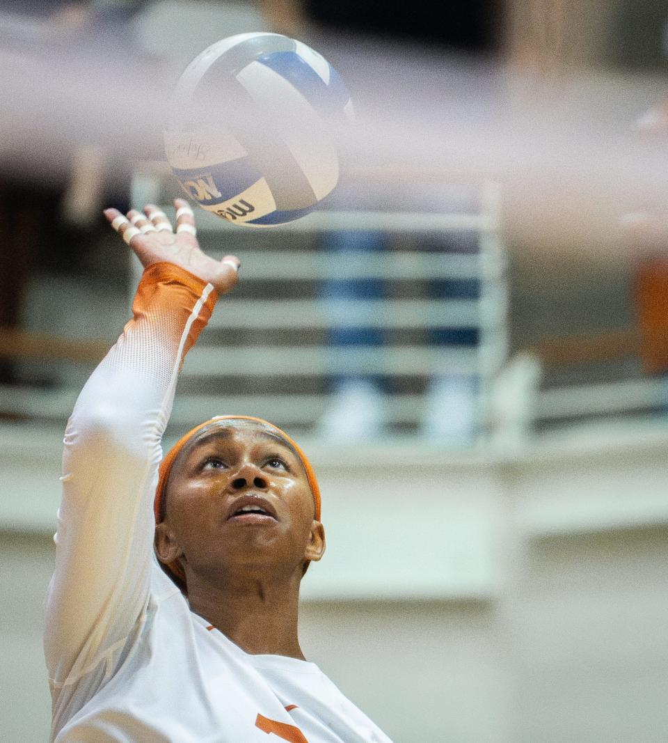 Texas middle blocker Asjia O'Neal (7) serves the ball during the first set in the Longhorns' match against the Iowa State Cyclones on Wednesday in Austin, Nov. 15, 2023.