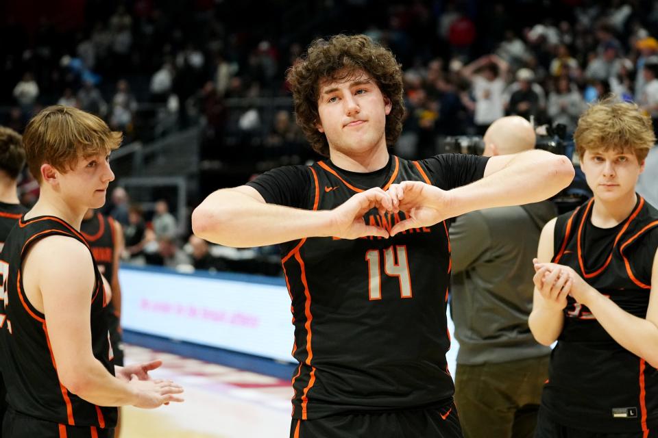 Delaware Hayes' Jake Lowman makes the sign of a heart to the fans after losing to Cleveland St. Ignatius on Saturday.