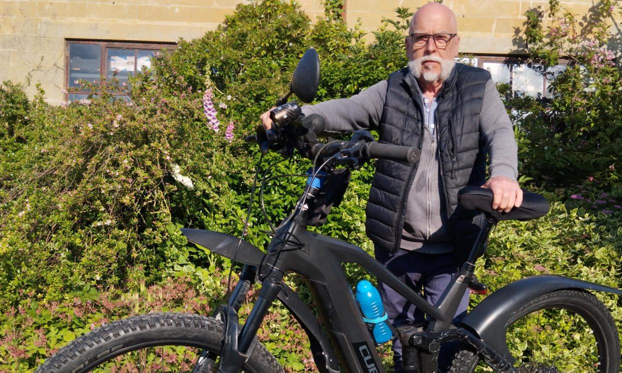 <span>Andy Fenwick, 71, with his £5,000 Cube ebike.</span><span>Photograph: Andy Fenwick</span>