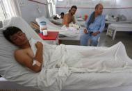 A wounded Afghan man, who survived last night's attack at American University of Afghanistan, receives treatment at the Emergency Hospital in Kabul, Afghanistan August 25, 2016. REUTERS/Omar Sobhani