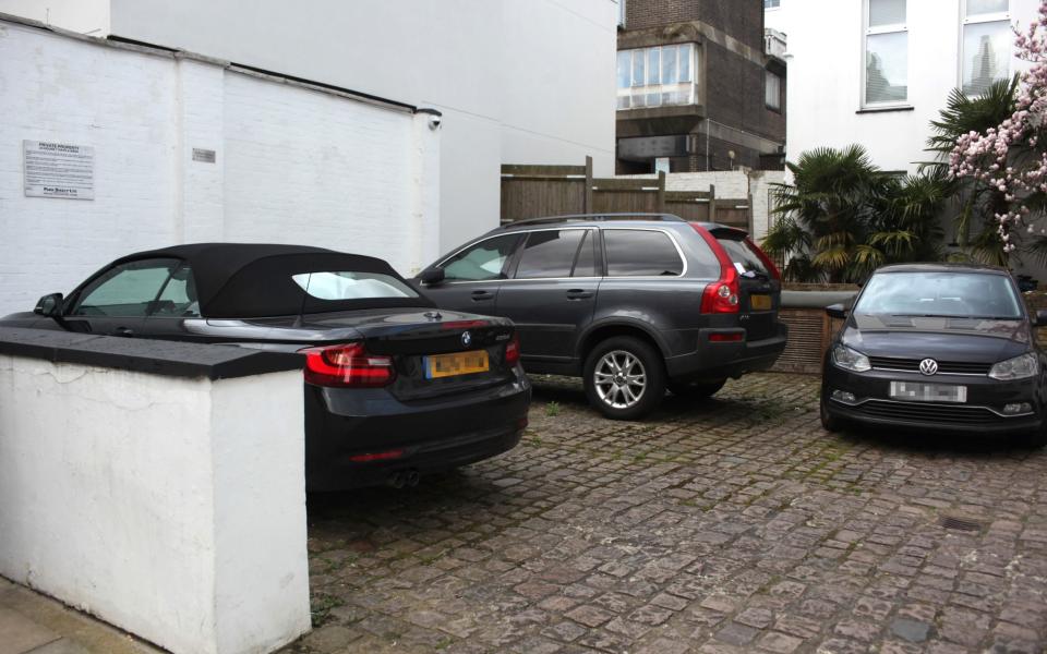 One resident in the Hampstead block claims her space has been squeezed into a gap wide enough only for a 'professional driver' between a BMW and 4x4 Volvo - Paul Keogh