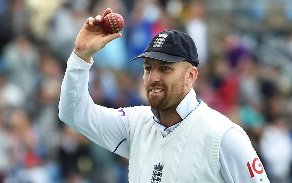 England's Jack Leach celebrates after taking five wickets during the fourth day of the third cricket test match between England and New Zealand at Headingley in Leeds, England, Sunday, June 26, 2022. - AP