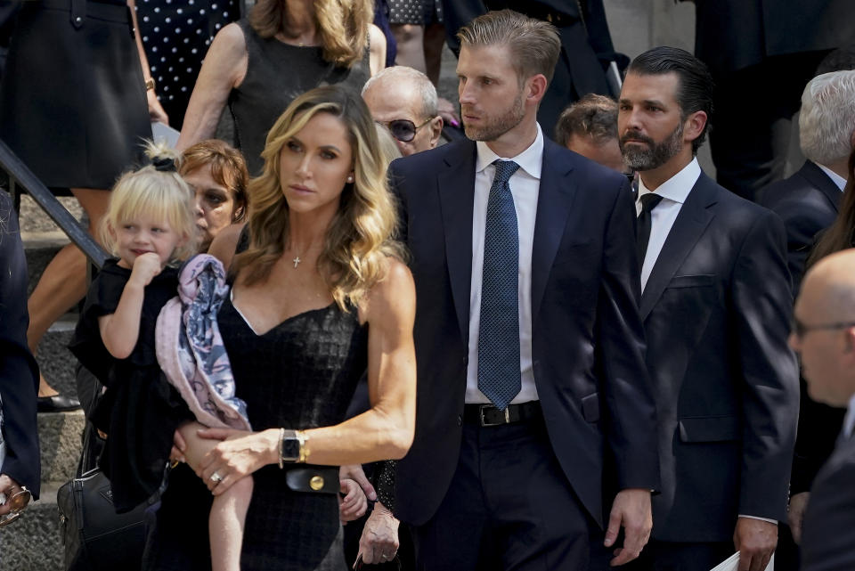 From right, Donald Trump Jr. and Eric Trump leave St. Vincent Ferrer Roman Catholic Church after the funeral of Ivana Trump, Wednesday, July 20, 2022, in New York. The life of Ivana Trump was celebrated at a funeral Mass following her death last week. The 73-year-old Ivana Trump died at her Manhattan home. Authorities say the death was an accident, with blunt impact injuries to her torso as the cause. (AP Photo/John Minchillo)