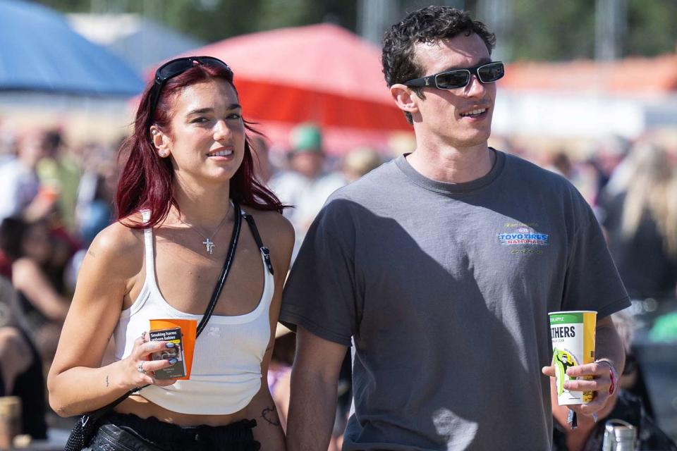 <p>Samir Hussein/WireImage</p> Dua Lipa and Callum Turner during day four of Glastonbury Festival 2024 at Worthy Farm, Pilton on June 29, 2024