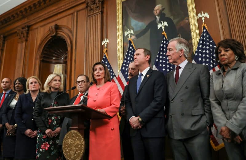 U.S. House Speaker Pelosi holds engrossment ceremony to sign Trump impeachment articles at the U.S. Capitol in Washington