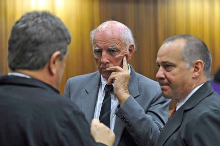 Former Grand Slam doubles tennis champion Bob Hewitt (C) looks on during his sentencing at a high court in Pretoria, May 18, 2015. REUTERS/Stringer