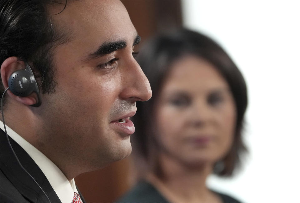 German Foreign Minister Annalena Baerbock, right, and her counterpart from Pakistan, Bilawal Bhutto Zardari address the media after a meeting at the Foreign Ministry in Berlin, Germany, Friday, Oct. 7, 2022. (AP Photo/Michael Sohn)