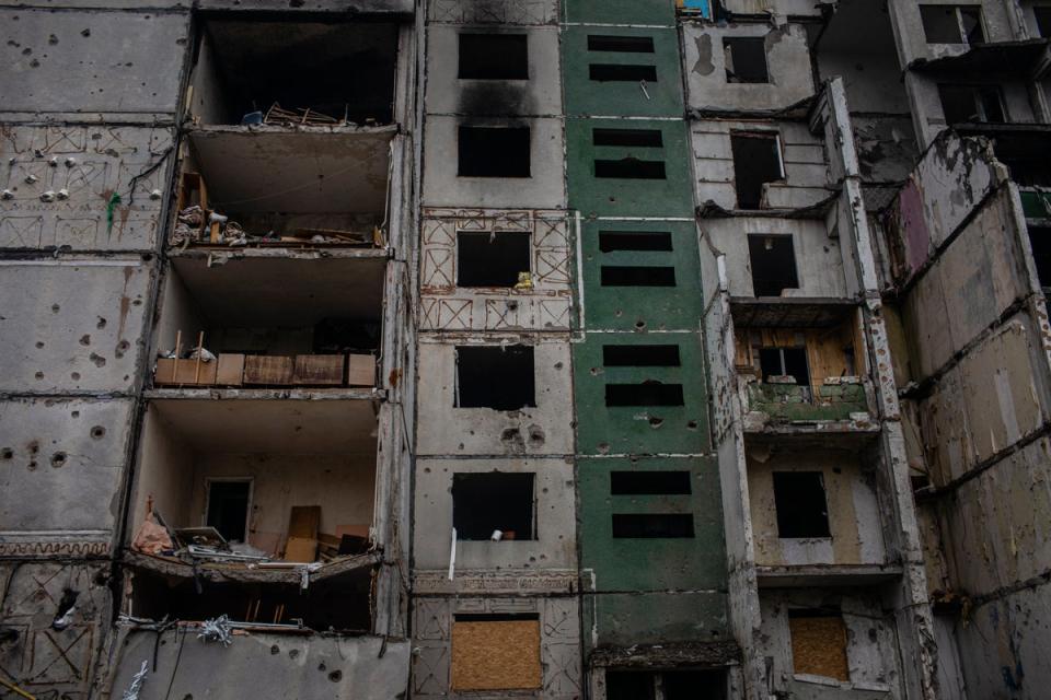 A teddy bear is seen propped up in a window of a destroyed apartment in Chernihiv city centre (Diego Ibarra Sánchez/Unicef)