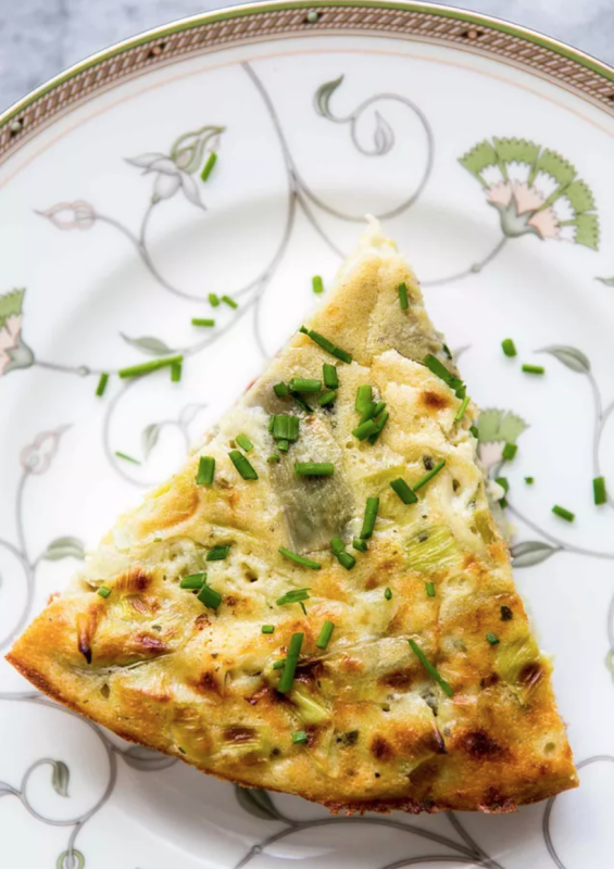 <p>Simply Recipes</p><p>Tender frittata with eggs, sautéed leeks, artichoke hearts, Parmesan, tarragon and chives. Perfect for Spring!</p><p><strong>Get the recipe: <a href="https://www.simplyrecipes.com/recipes/artichoke_leek_frittata/" rel="nofollow noopener" target="_blank" data-ylk="slk:Artichoke Leek Frittata;elm:context_link;itc:0;sec:content-canvas" class="link rapid-noclick-resp"><em>Artichoke Leek Frittata</em></a></strong></p>