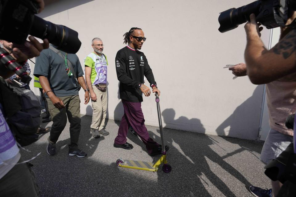 Mercedes driver Lewis Hamilton of Britain leaves after a news conference at the Monza racetrack, in Monza, Italy, Thursday, Sept. 8, 2022. The Formula one race will be held on Sunday. (AP Photo/Luca Bruno)