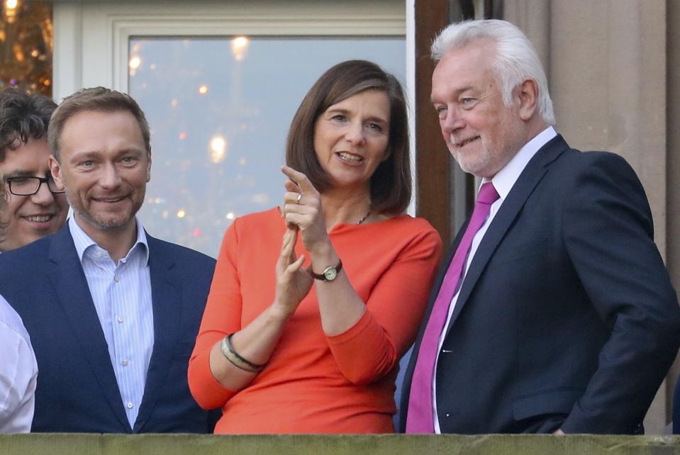 Drei der wichtigsten Köpfe der im Bundestag vertretenen Parteien. (Kay Nietfeld/dpa via AP)