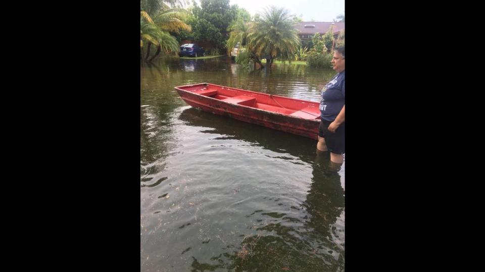 South Miami-Dade resident Sylvie Ritts used her boat to help her gardner stay above flooded streets in the community on Aug. 15, 2019. Ritts was featured on numerous TV news broadcasts, including CBS4 and WSVN7 as the neighborhood was hit by 6 inches or so of rain after heavy thunderstorms saturated the area.