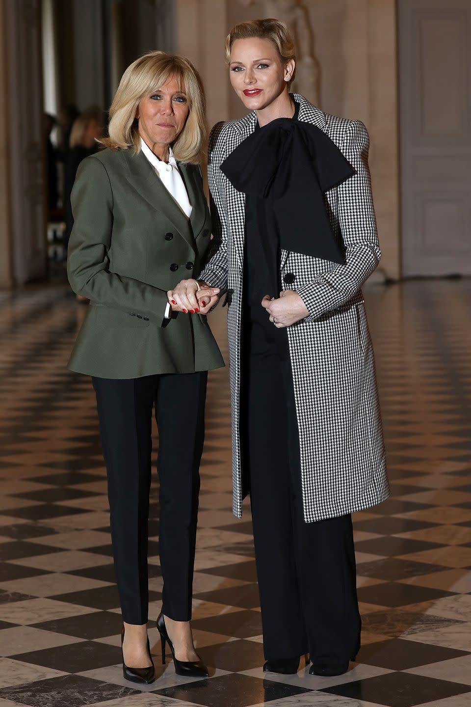 french president's wife brigite macron welcomes head of states' partners at chateau de versailles