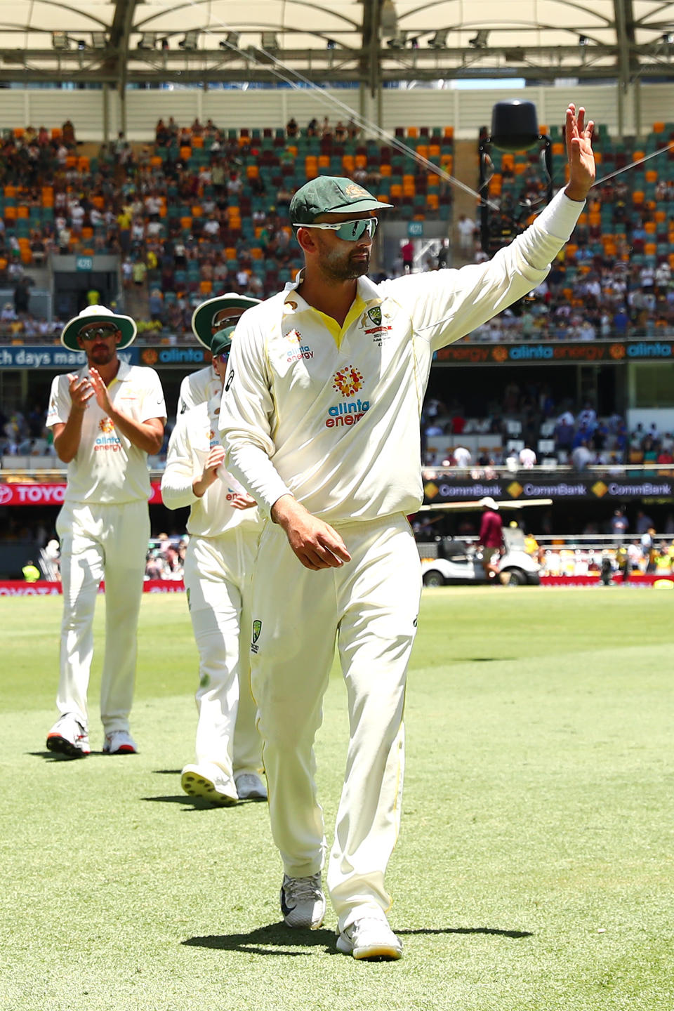 Nathan Lyon (pictured) thanks the crowd at the lunch break after taking 4 wickets during day four of the First Test Match in the Ashes series between Australia and England at The Gabba on December 11, 2021 in Brisbane, Australia.