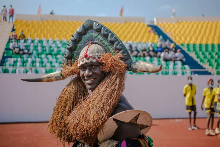 A man in traditional dress parades in the September 24 Stadium prior the ceremony celebrating Independence Day in Bissau on November 16, 2021. - Independence Day 2021 was postponed by two months by decision of President Umaro Sissoco Embalo due to covid-19 and bad weather.