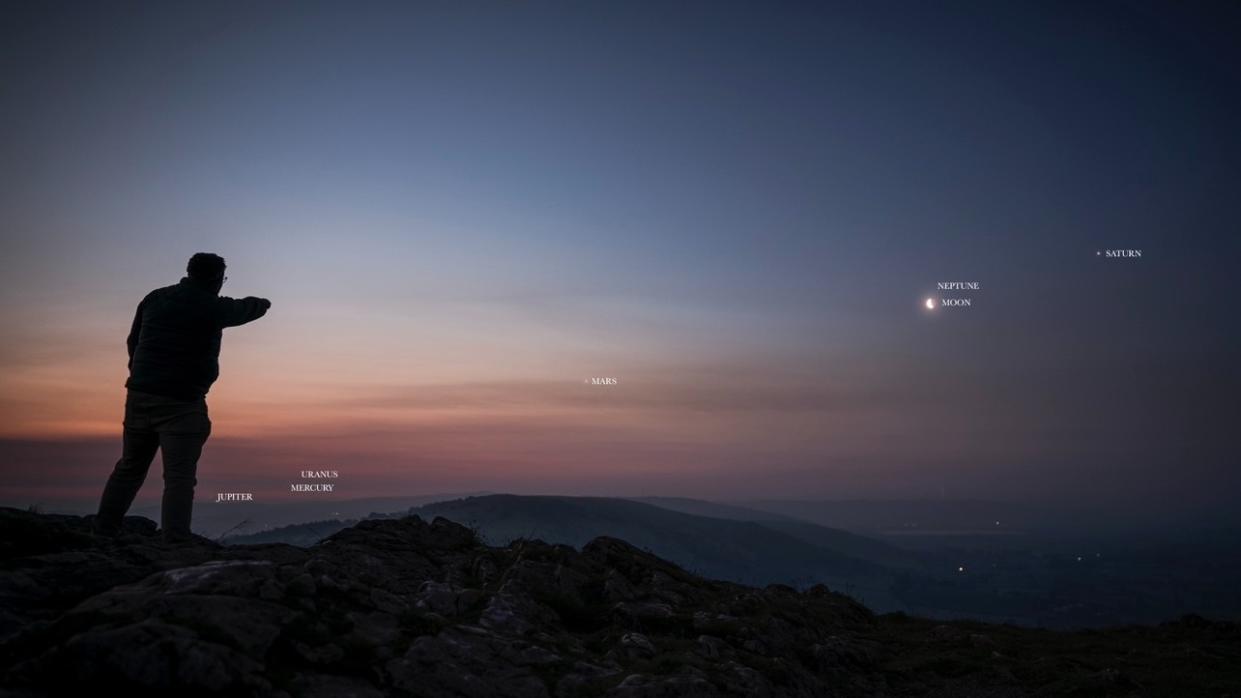  The composite image shows the planetary parade, along with the moon, during the early hours of June 1. 