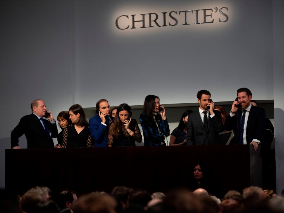 Agents at a Christie's auction