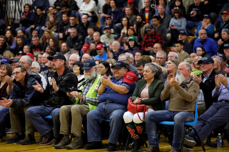 FILE PHOTO: Crowds cheer for a speaker during a rally for Wexit Alberta, a separatist group seeking federal political party status, in Calgary