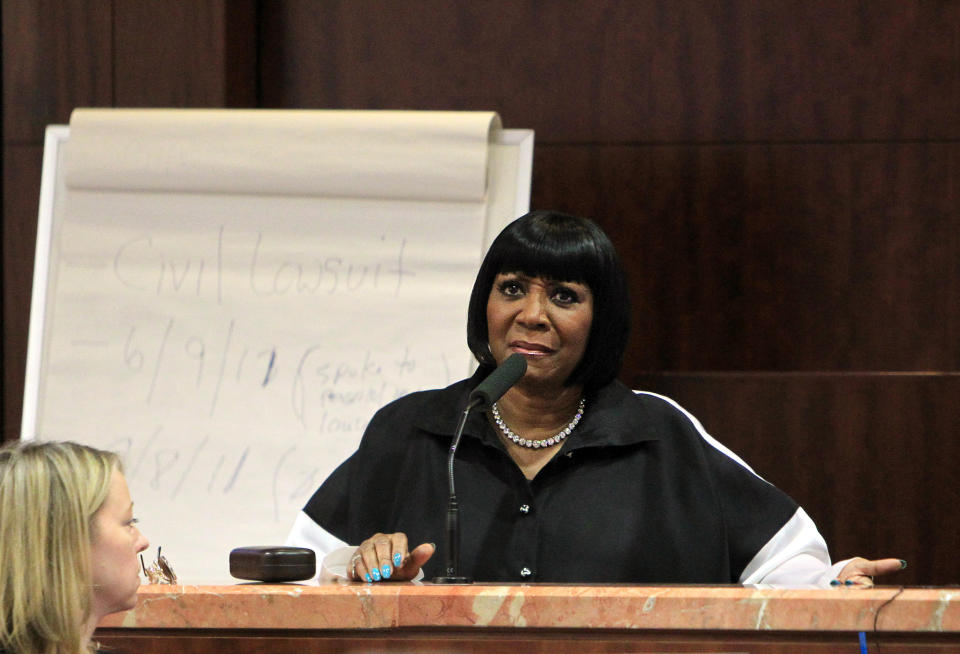 Singer Patti LaBelle testifies on the witness stand at the Harris County Criminal Courthouse for the lawsuit against her bodyguards on Thursday, Nov. 7, 2013, in Houston. LaBelle told a Houston court Thursday that Richard King scared her in 2011 when he staggered toward her limousine at George Bush Intercontinental Airport. LaBelle's bodyguard, Efrem Holmes, is charged with misdemeanor assault in the clash caught on security video that landed King in a hospital with a head wound. Records show King's blood alcohol level was more than three times the legal limit for driving. King testified Thursday that he could not remember details of the incident. King has also filed a civil lawsuit against the singer and Holmes. LaBelle has countersued.(AP Photo/Houston Chronicle, Mayra Beltran)