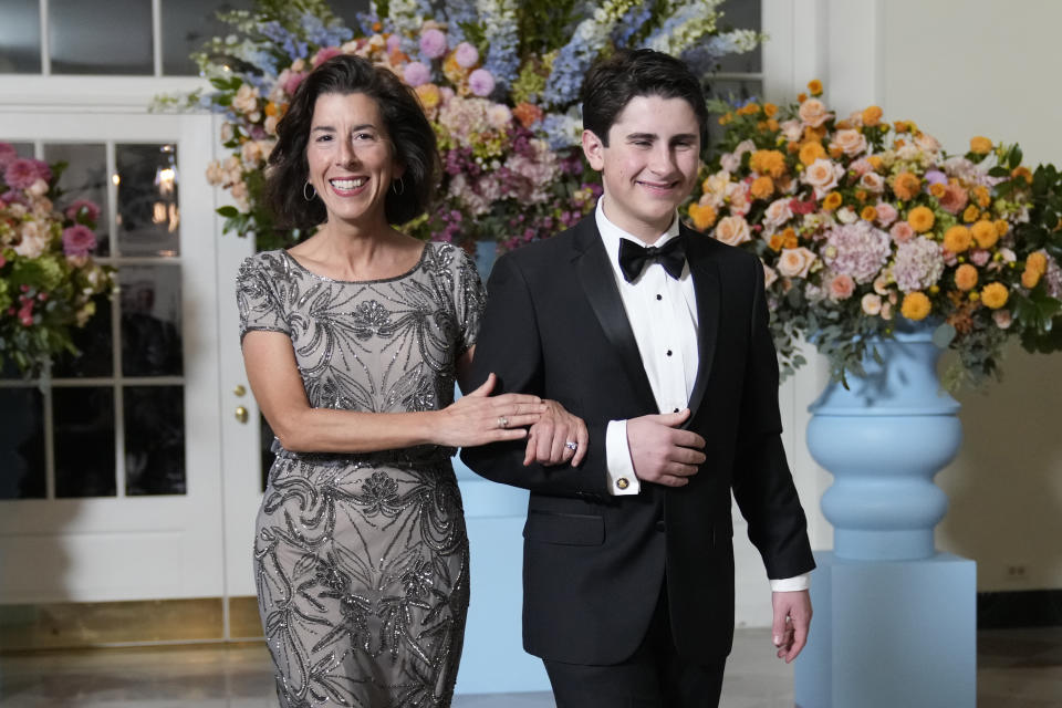 Secretary of Commerce Gina Raimondo and Tommy Moffit arrive for the State Dinner hosted by President Joe Biden and first lady Jill Biden in honor of Australian Prime Minister Anthony Albanese, at the White House in Washington, Wednesday, Oct. 25, 2023, in Washington. (AP Photo/Manuel Balce Ceneta)