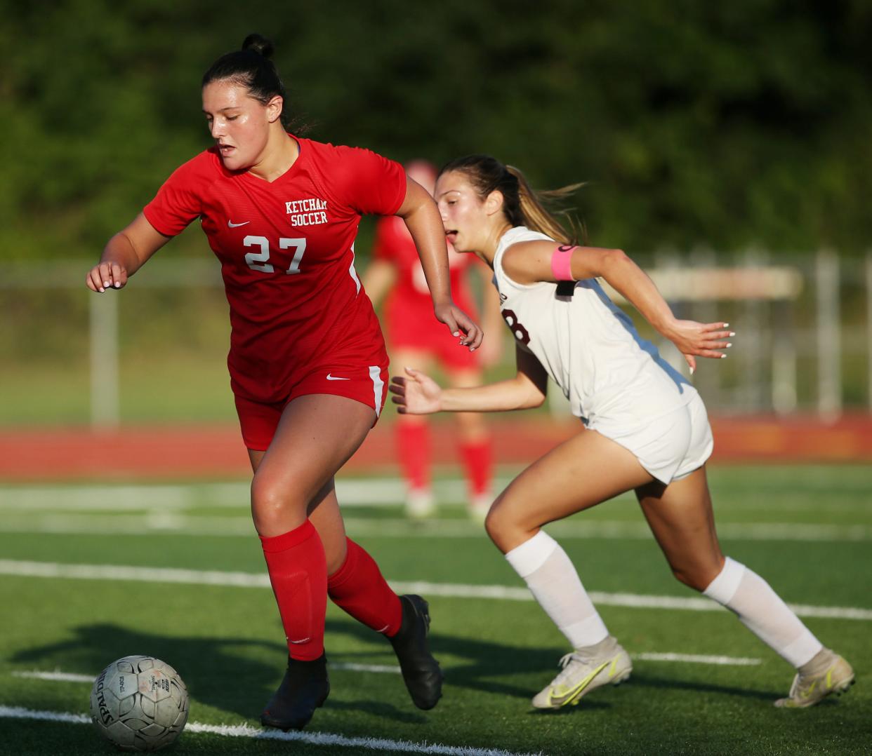 Ketcham's Kathryn Hotle brings the ball up field ahead of Ossining's Adrienne Kantrowitz during Tuesday's girls soccer game in Wappingers Falls on September 12, 2023.