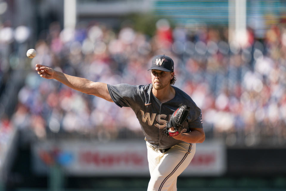 Washington Nationals starting pitcher Jake Irvin delivers during the third inning of a baseball game against the Philadelphia Phillies, Saturday, Aug. 19, 2023, in Washington. (AP Photo/Stephanie Scarbrough)