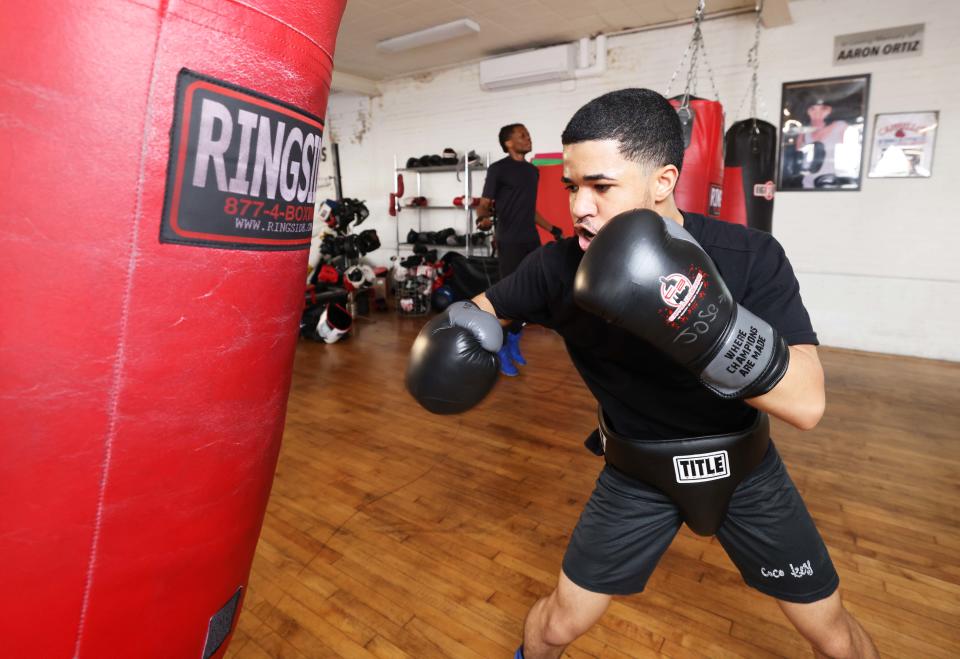 Jose Perez, 17, hits the traditional heavy bag at Cappiello Boxing Gym in Brockton on Thursday, May 2, 2024.