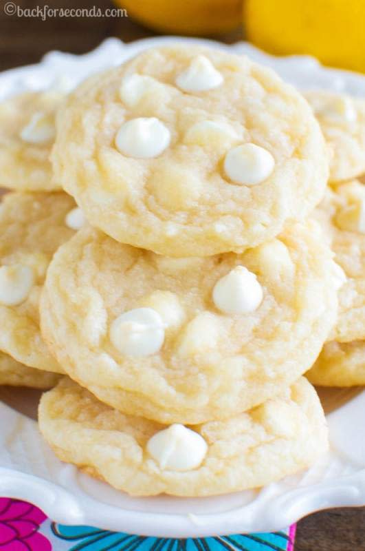 <p>These Chewy Lemon Cookies are downright irresistible! Light and chewy, with a punch of lemon and sweet white chocolate chips. Your new favorite cookie! </p><p><strong>Get the recipe:</strong><a href="http://backforseconds.com/chewy-lemon-cookies/" rel="nofollow noopener" target="_blank" data-ylk="slk:Chewy Lemon Cookies;elm:context_link;itc:0;sec:content-canvas" class="link "><strong> Chewy Lemon Cookies</strong></a></p><p><strong>Related: <a href="https://www.yahoo.com/lifestyle/31-bursting-tart-flavor-lemon-155717658.html" data-ylk="slk:32 Best Lemon Dessert Recipes;elm:context_link;itc:0;sec:content-canvas;outcm:mb_qualified_link;_E:mb_qualified_link;ct:story;" class="link  yahoo-link">32 Best Lemon Dessert Recipes</a></strong></p>