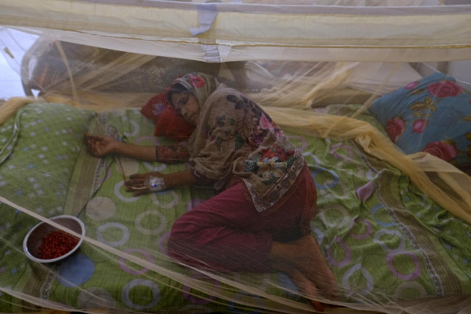 A woman suffering from dengue receives treatment at Mugda Medical College and Hospital in Dhaka, Bangladesh, Thursday, Aug. 10, 2023. (AP Photo/Mahmud Hossain Opu)