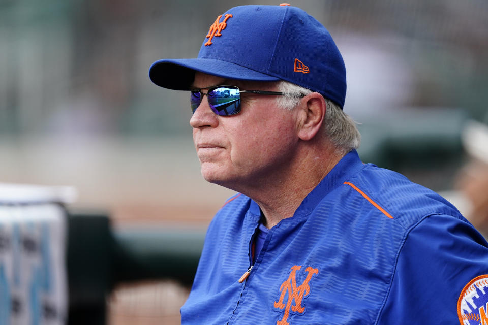 New York Mets manager Buck Showalter looks on from the dugout during a baseball game against the Atlanta Braves, Wednesday, July 13, 2022, in Atlanta. (AP Photo/John Bazemore)