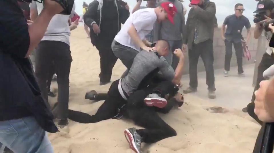 Violence erupted at a Make America Great Again rally in Huntington Beach