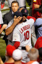 ARLINGTON, TX - OCTOBER 22: Albert Pujols #5 and manager Tony La Russa celebrate after defeating the Texas Rangers 16-7 in Game Three of the MLB World Series at Rangers Ballpark in Arlington on October 22, 2011 in Arlington, Texas. (Photo by Tom Pennington/Getty Images)