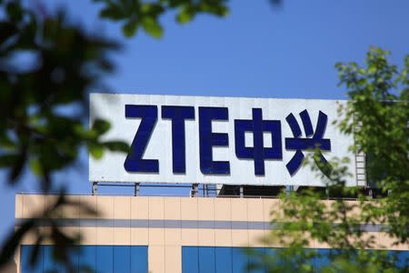 The logo of China's ZTE Corp is seen on a building in Nanjing, Jiangsu province, China April 19, 2018. Picture taken April 19, 2018. REUTERS/Stringer