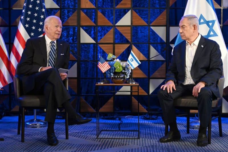 Joe Biden (L), President of the USA, and Benjamin Netanyahu, Prime Minister of Israel, sit together for talks during their meeting. Avi Ohayon/GPO/dpa