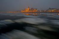 The Hungarian Parliament is seen with the icy Danube river in the foreground as the Hungarian capital bids for the 2024 Olympic Games, in central Budapest, Hungary January 31, 2017. REUTERS/Laszlo Balogh