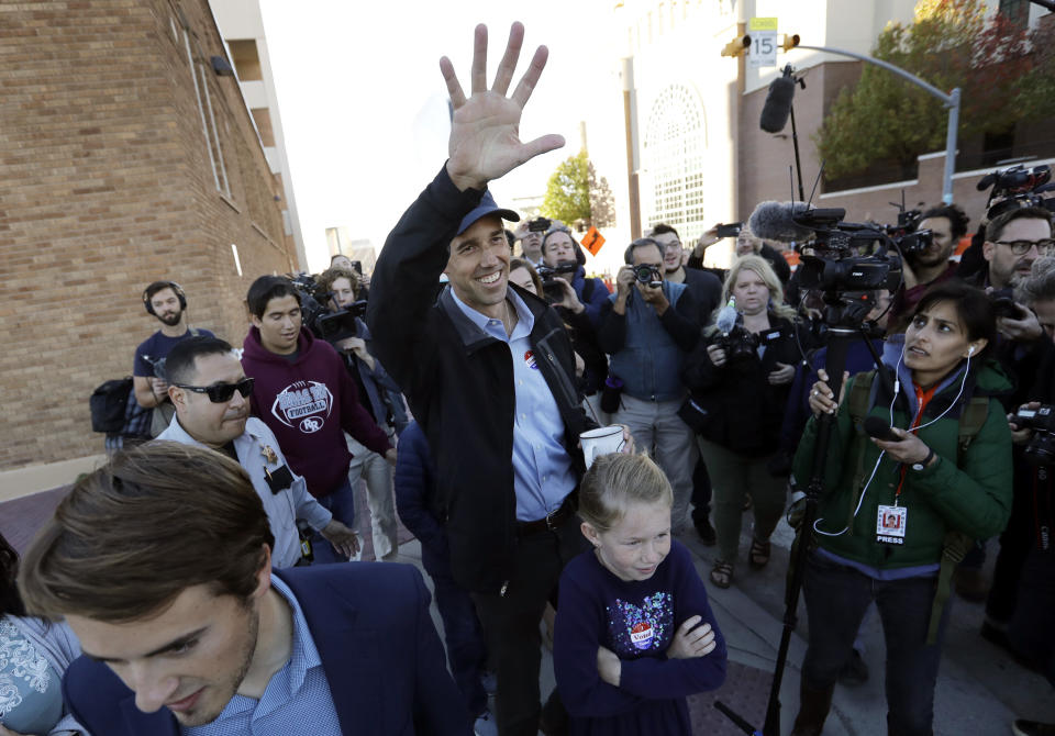 Rep. Beto O'Rourke, the 2018 Democratic Candidate for the Senate in Texas, waves to supporters as he leaves a polling place with his family after voting, Tuesday, Nov. 6, 2018, in El Paso, Texas. (AP Photo/Eric Gay)
