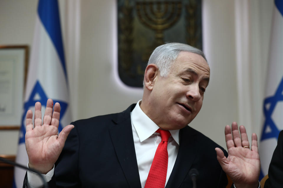 Israeli Prime Minister Benjamin Netanyahu reacts during the weekly cabinet meeting, at his office in Jerusalem, Sunday, Dec. 15, 2019. (Gali Tibbon/Pool via AP)