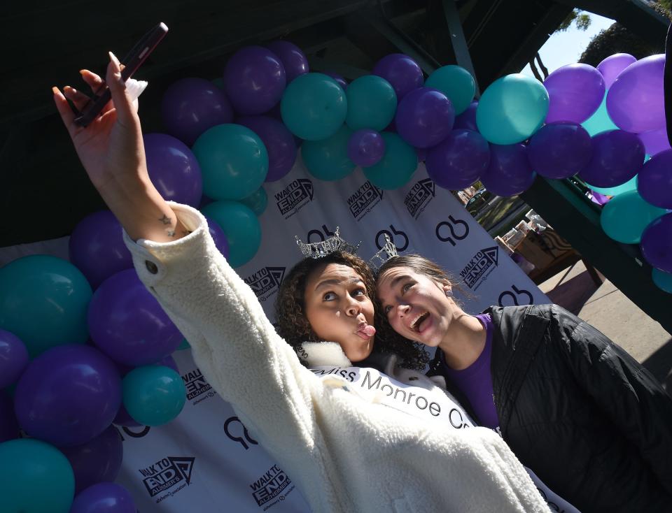 Miss Monroe County Payton Perry-Radcliffe and Miss Monroe County Teen MaKayla Dickinson have a little fun taking a selfie photo while attending the Alzheimer Walk last October in Monroe. Payton and MaKayla will compete this coming week in Muskegon for the Miss Michigan and Miss Michigan Teen titles.