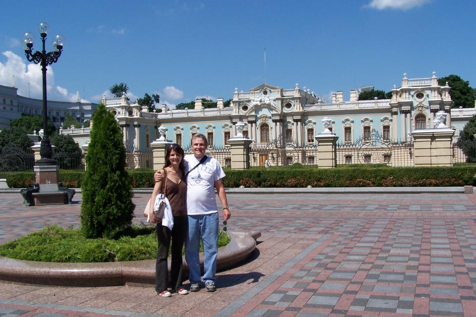 Mara Bellaby, then a reporter for Associated Press in Kyiv, Ukraine, with her father, Paul Dwyer, outside the Mariinsky Palace in Ukraine in the early 2000s.