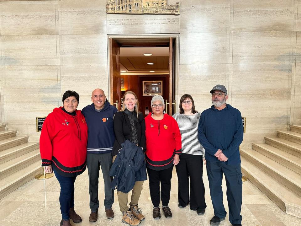 Members of NunatuKavut Community Council, including president Todd Russell, second from left, are in Ottawa for the two-day hearing. 