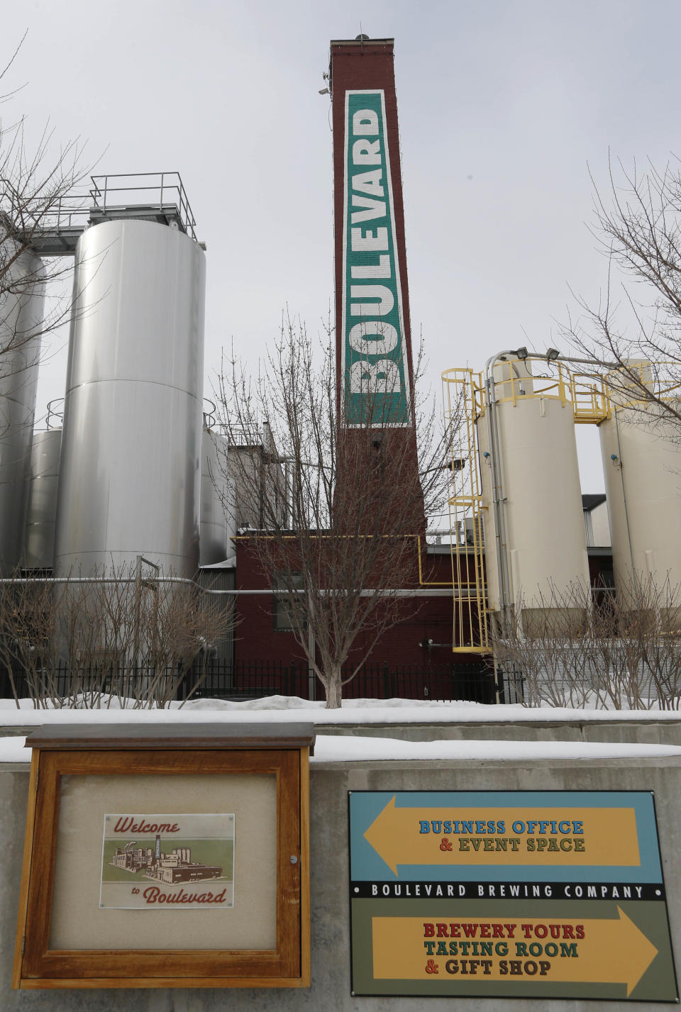 Signs direct visitors outside the entrance of Boulevard Brewing Company in Kansas City, Mo., Wednesday, Feb. 12, 2014. Boulevard Brewing Co., Kansas City’s biggest brewer and maker of the coveted Chocolate Ale and other beer, holds free 45-minute tours that showcase Boulevard’s history and brewing process and end at the tasting room. (AP Photo/Orlin Wagner)