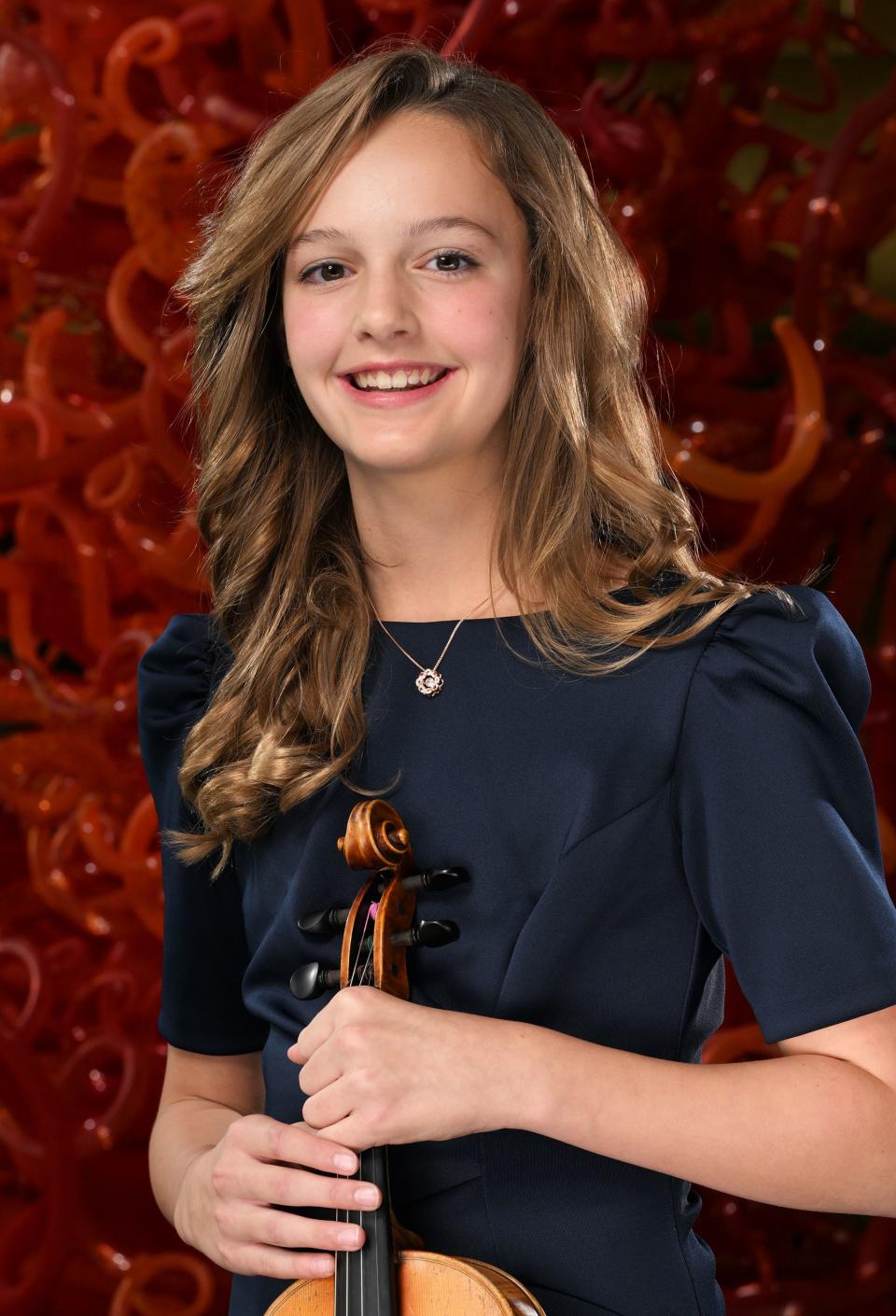 Sophie Wilkes, violinist, poses for photos for the 2023 Salute to Youth Portraits at Abravanel Hall in Salt Lake City on Wednesday, Oct. 4, 2023. | Scott G Winterton, Deseret News