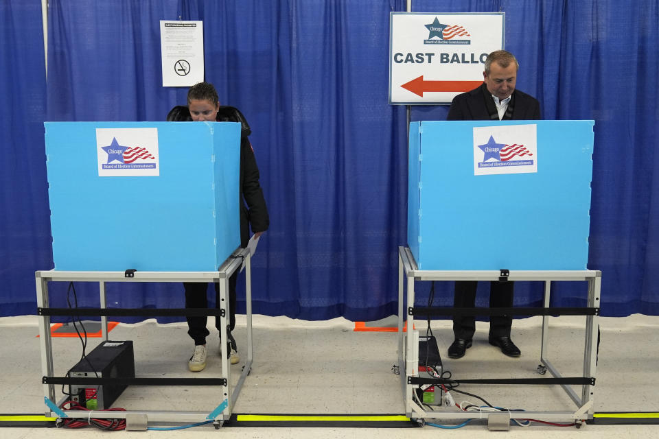 Voters cast ballots at Chicago Loop Super Site in Chicago, Tuesday, March 19, 2024. Illinois residents will vote Tuesday to narrow Democratic and GOP candidate fields in key U.S. House races. (AP Photo/Nam Y. Huh)