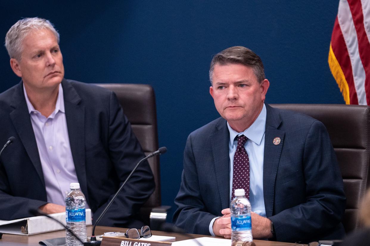 Maricopa County District 4 Supervisor Clint Hickman, left, and Maricopa County District 3 Supervisor Bill Gates, right, attend a special board of supervisors meeting to vote on appointing a new sheriff in Phoenix on Feb. 8, 2024.