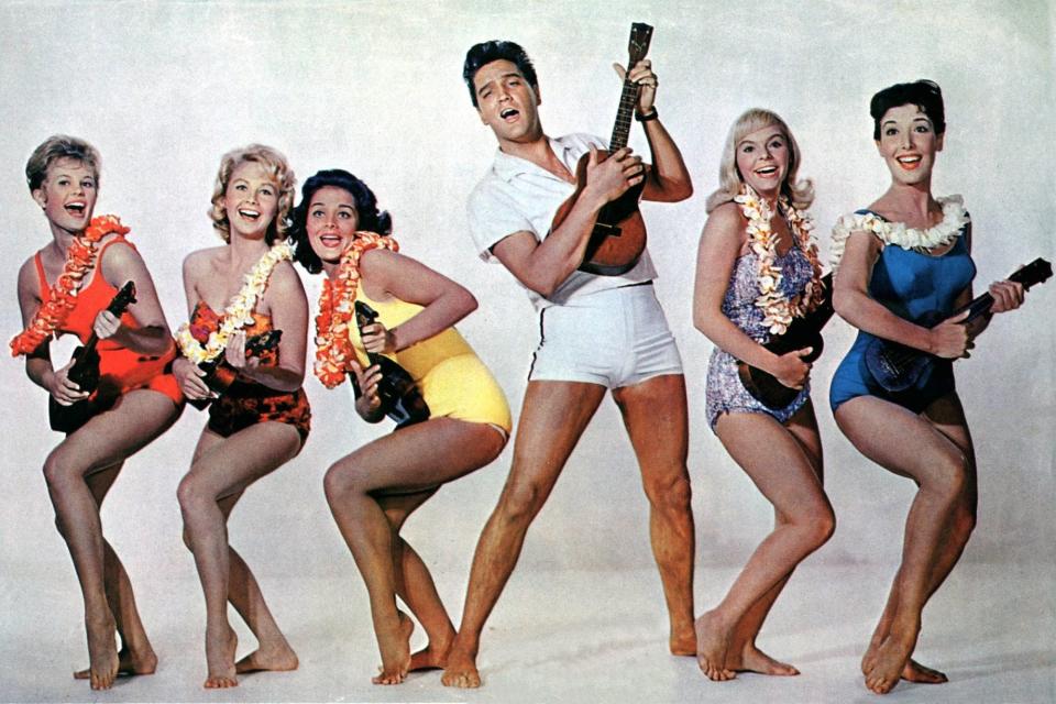 If only all ukulele flash mobs were like this: Elvis and friends in a publicity pose for "Blue Hawaii."