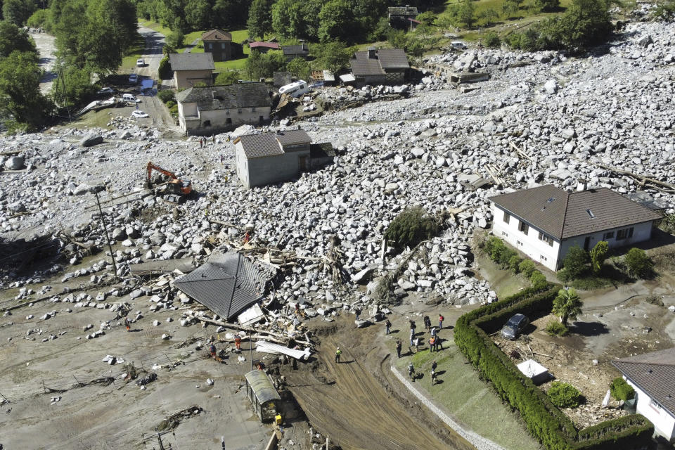The Sorte village, community of Lostallo, in Southern Switzerland, is seen after a landslide, caused by the bad weather and heavy rain in the Misox valley, in Lostallo, Southern Switzerland, Saturday, June 22 2024. Massive thunderstorms and rainfall had led to a flooding situation on Friday evening after a landslide in the Misox valley. Four people went missing on Saturday morning. Several dozen people had to be evacuated from their homes in the Misox and Calanca regions. (Samuel Golay/Keystone via AP)